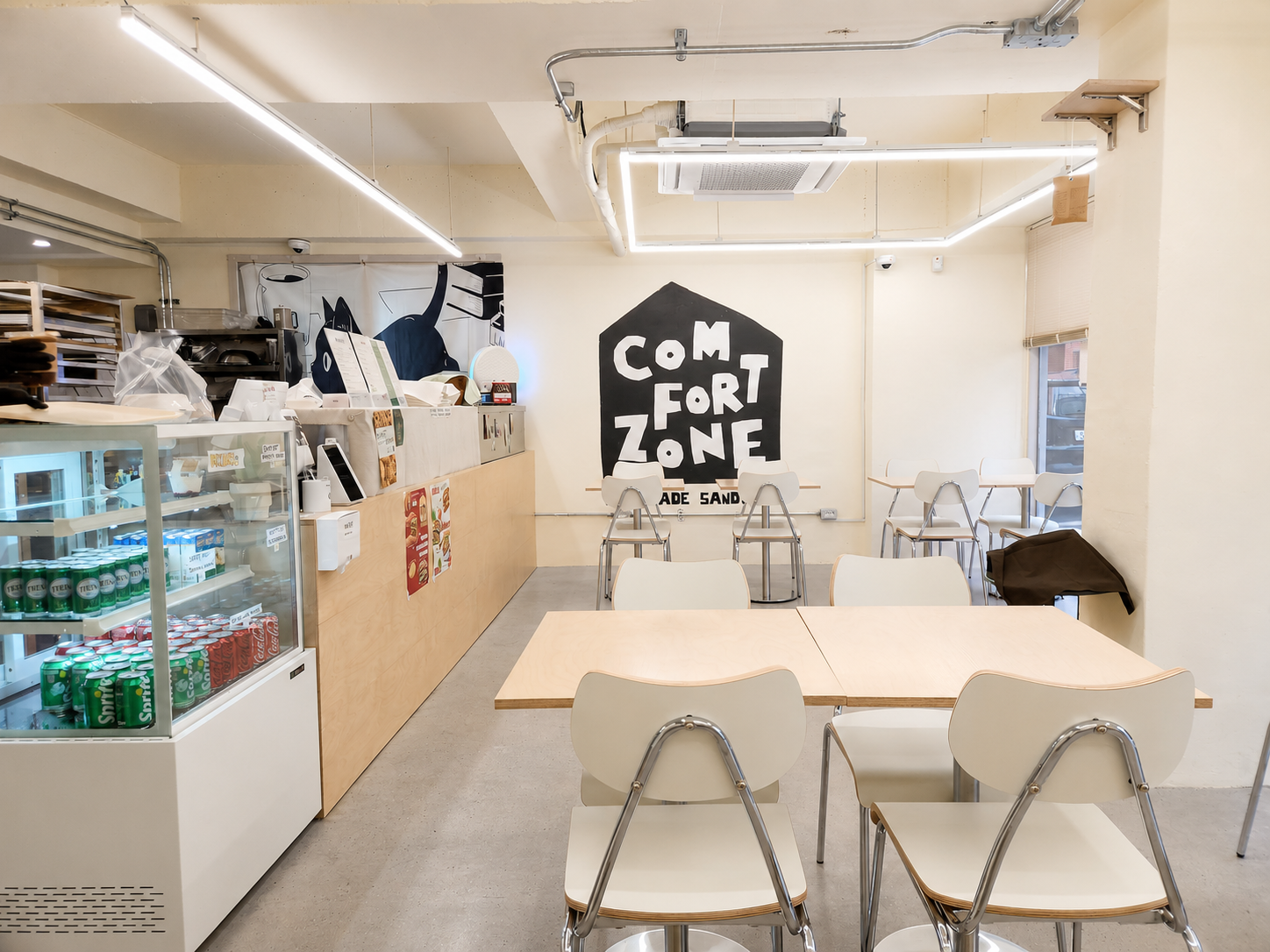 COMFORT ZONE sandwich café seating and exposed conduit